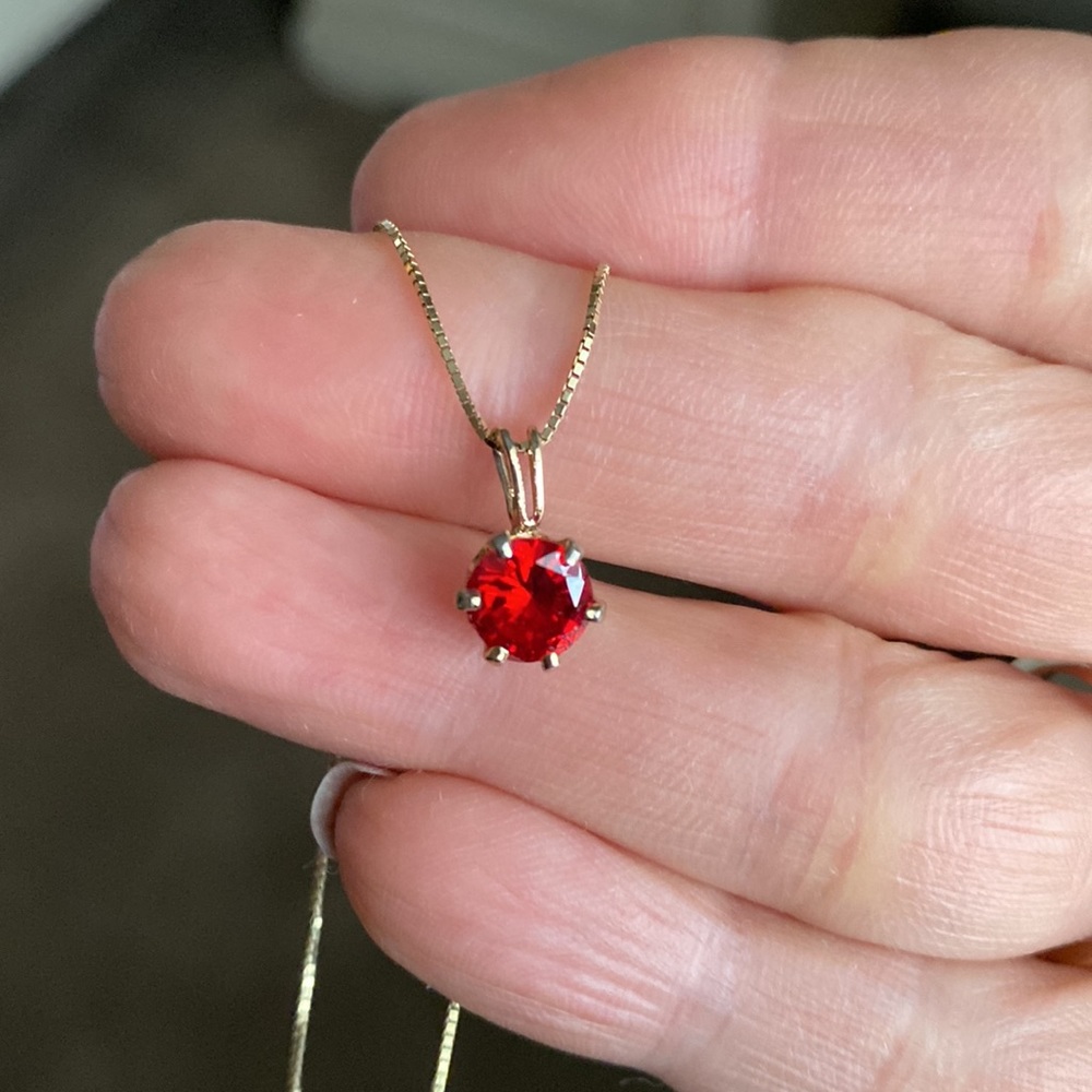 Round simulated ruby pendant